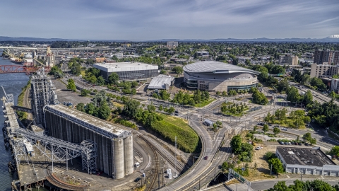 DXP001_012_0005 - Aerial stock photo of Moda Center and Veterans Memorial Coliseum in Northeast Portland, Oregon