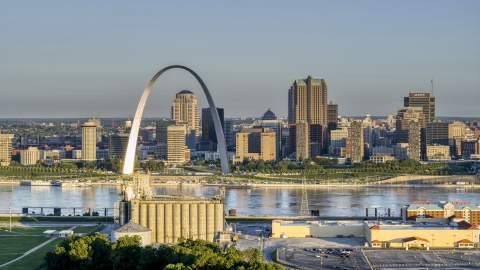 DXP001_021_0002 - Aerial stock photo of The Arch and skyline, seen from a casino by the Mississippi River, sunrise, Downtown St. Louis, Missouri