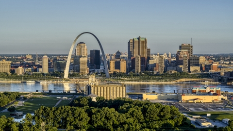 DXP001_021_0004 - Aerial stock photo of The skyline and Arch across from a park and grain elevator, Downtown St. Louis, Missouri