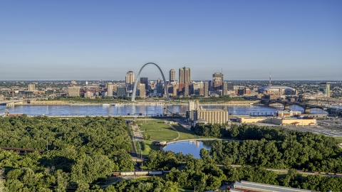 DXP001_022_0001 - Aerial stock photo of A park and the St. Louis skyline across Mississippi River,Downtown St. Louis, Missouri