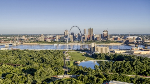 DXP001_022_0004 - Aerial stock photo of The Arch and skyline seen from a riverfront park, Downtown St. Louis, Missouri