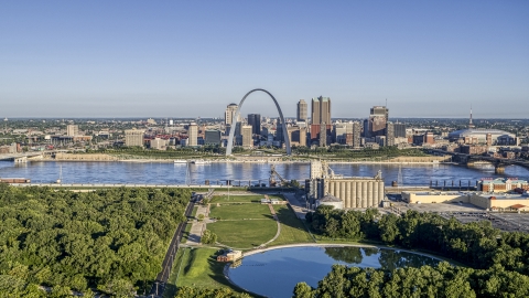 DXP001_022_0005 - Aerial stock photo of Riverfront park with Arch and skyline across the river, Downtown St. Louis, Missouri
