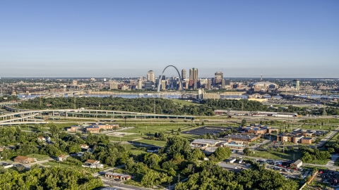 DXP001_022_0007 - Aerial stock photo of A wide view of skyline and Arch from interstate and park, Downtown St. Louis, Missouri