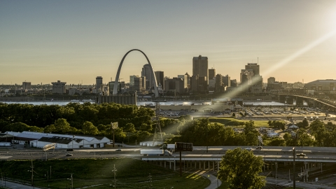 DXP001_027_0004 - Aerial stock photo of The Gateway Arch and Downtown St. Louis at sunset, seen from East St. Louis, Illinois