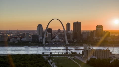 DXP001_029_0002 - Aerial stock photo of The iconic Gateway Arch and Downtown St. Louis skyline, Missouri at sunset