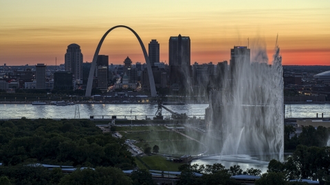 DXP001_030_0001 - Aerial stock photo of The Gateway Geyser and Arch, Downtown St. Louis, Missouri, twilight