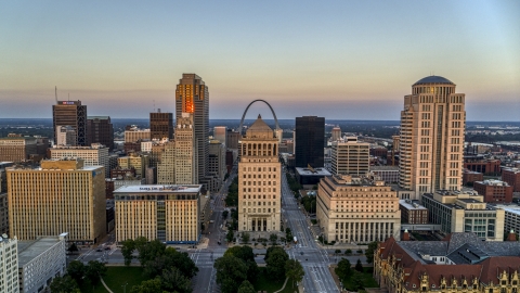 DXP001_036_0004 - Aerial stock photo of The Arch behind the courthouses and skyscrapers at twilight, Downtown St. Louis, Missouri