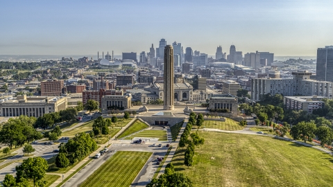 DXP001_043_0006 - Aerial stock photo of The WWI memorial and museum in Kansas City, Missouri, with a view of the downtown skyline