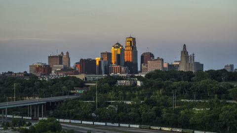 DXP001_046_0005 - Aerial stock photo of The tall skyscrapers of the city skyline at sunset in Downtown Kansas City, Missouri