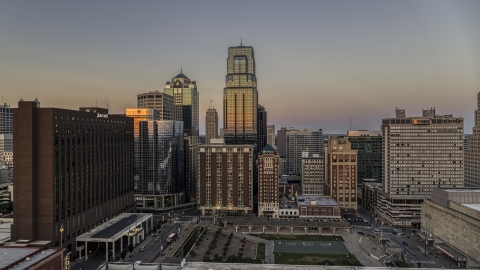 DXP001_051_0012 - Aerial stock photo of Skyscrapers at twilight in Downtown Kansas City, Missouri