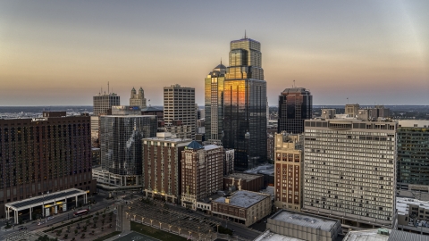 DXP001_051_0015 - Aerial stock photo of Skyscrapers and city buildings at twilight in Downtown Kansas City, Missouri