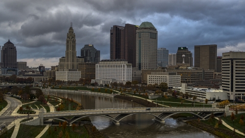 DXP001_087_0003 - Aerial stock photo of A view of the city skyline from a bridge spanning the Scioto River, Downtown Columbus, Ohio