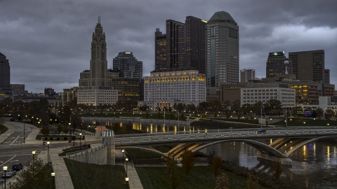 DXP001_087_0006 - Aerial stock photo of The city skyline and the Scioto River at twilight, Downtown Columbus, Ohio