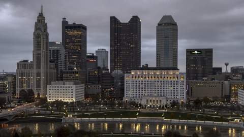 DXP001_087_0009 - Aerial stock photo of Scioto River and the city skyline at twilight, Downtown Columbus, Ohio
