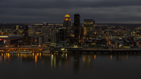 DXP001_096_0015 - Aerial stock photo of The city's skyline at twilight, seen from Ohio River, Downtown Louisville, Kentucky