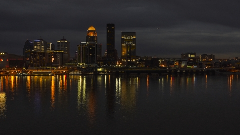 DXP001_096_0017 - Aerial stock photo of The city skyline at twilight across the river, Downtown Louisville, Kentucky