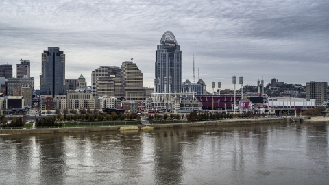 DXP001_097_0001 - Aerial stock photo of A view of the baseball stadium and skyscraper from the river, Downtown Cincinnati, Ohio