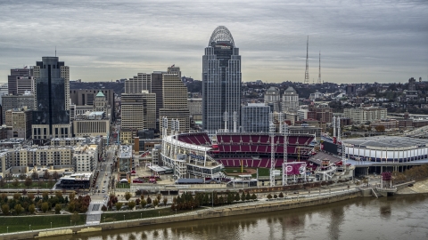 DXP001_097_0002 - Aerial stock photo of the baseball stadium and skyscraper seen from the river, Downtown Cincinnati, Ohio