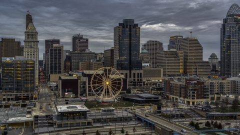 DXP001_097_0010 - Aerial stock photo of The Ferris wheel and the city skyline at sunset, Downtown Cincinnati, Ohio