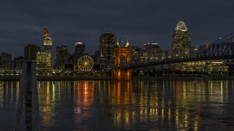 DXP001_098_0016 - Aerial stock photo of The city's downtown skyline across the Ohio River at twilight, Downtown Cincinnati, Ohio