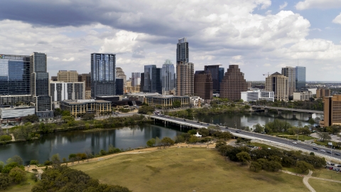 DXP002_102_0007 - Aerial stock photo of A view of the city's skyline from the First Street Bridge and Lady Bird Lake, Downtown Austin, Texas