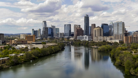 DXP002_102_0019 - Aerial stock photo of A view of the city skyline and Lady Bird Lake in Downtown Austin, Texas