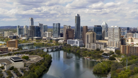 DXP002_102_0022 - Aerial stock photo of The city skyline by Lady Bird Lake, Downtown Austin, Texas