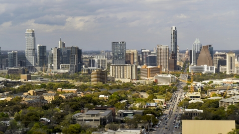 DXP002_103_0012 - Aerial stock photo of Congress Avenue and a view of the city's skyline in Downtown Austin, Texas