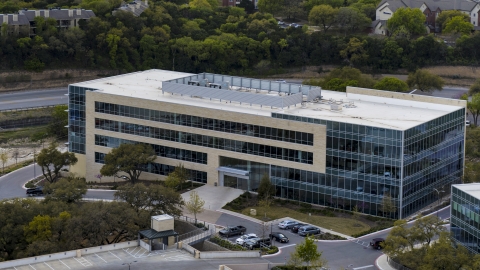 DXP002_104_0010 - Aerial stock photo of A view of a modern office building in Austin, Texas