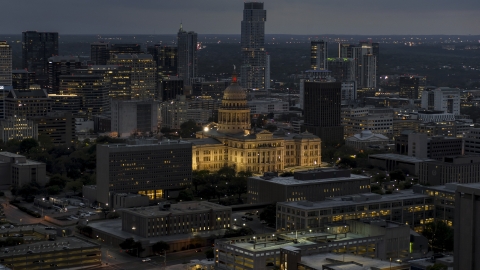 DXP002_105_0022 - Aerial stock photo of The Texas State Capitol at twilight in Downtown Austin, Texas