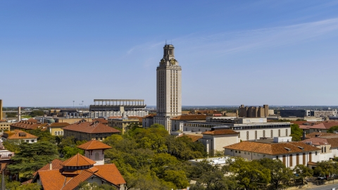 DXP002_107_0005 - Aerial stock photo of UT Tower at the University of Texas during ascent, Austin, Texas