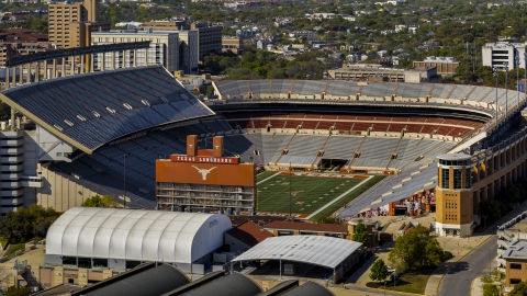 DXP002_108_0005 - Aerial stock photo of A view of the empty football stadium at the University of Texas, Austin, Texas
