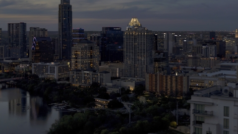 DXP002_110_0020 - Aerial stock photo of San Jacinto Center at twilight in Downtown Austin, Texas