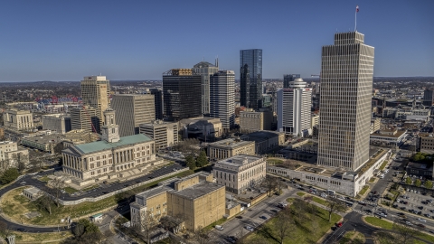 DXP002_114_0003 - Aerial stock photo of The Tennessee State Capitol near skyscrapers and Tennessee Tower in Downtown Nashville, Tennessee