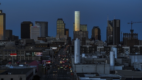 DXP002_115_0003 - Aerial stock photo of Church Street and view of city's skyline at twilight in Downtown Nashville, Tennessee
