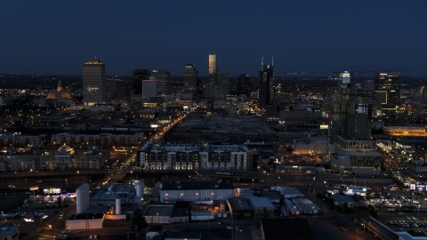 DXP002_115_0010 - Aerial stock photo of A wide view of the city skyline, high-rise under construction at twilight, Downtown Nashville, Tennessee