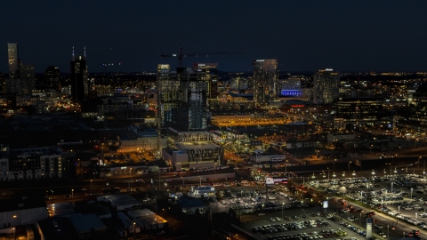 DXP002_115_0017 - Aerial stock photo of A high-rise building under construction at night, Downtown Nashville, Tennessee