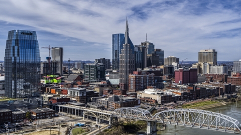 DXP002_116_0004 - Aerial stock photo of AT&T Building near bridge and Cumberland River in Downtown Nashville, Tennessee
