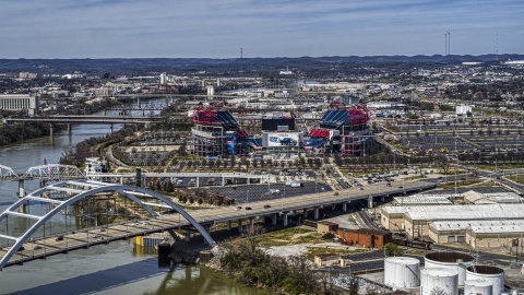 DXP002_116_0017 - Aerial stock photo of A view of Nissan Stadium from bridge in Nashville, Tennessee