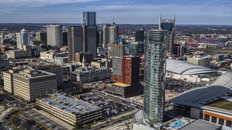 DXP002_118_0009 - Aerial stock photo of The JW Marriott hotel, skyscrapers in background in Downtown Nashville, Tennessee