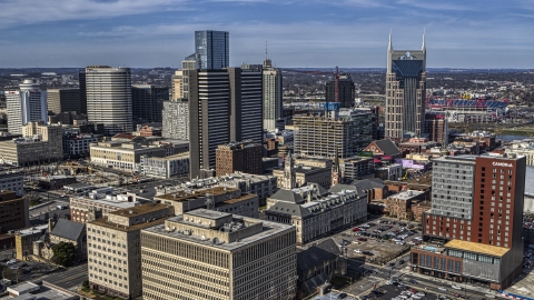 DXP002_118_0010 - Aerial stock photo of High-rise hotel and skyscrapers in Downtown Nashville, Tennessee