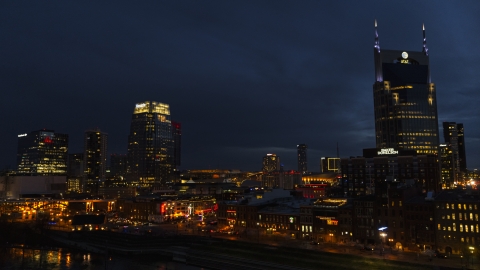 DXP002_121_0007 - Aerial stock photo of Broadway between the Pinnacle skyscraper and AT&T Building at twilight, Downtown Nashville, Tennessee