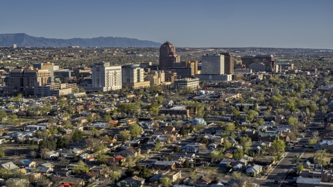 DXP002_122_0001 - Aerial stock photo of The city's high-rises seen from residential neighborhoods in Downtown Albuquerque, New Mexico