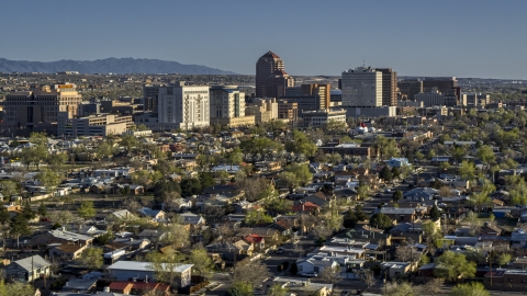 DXP002_122_0004 - Aerial stock photo of A view of the city's high-rises from neighborhoods, Downtown Albuquerque, New Mexico