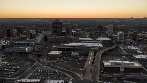 DXP002_123_0003 - Aerial stock photo of Albuquerque Plaza and Hyatt Regency at sunset near office high-rises, Downtown Albuquerque, New Mexico