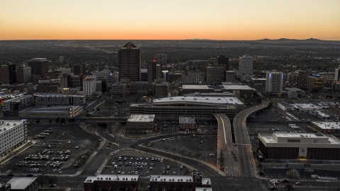 DXP002_123_0004 - Aerial stock photo of Albuquerque Plaza, Hyatt Regency, office high-rises at sunset in Downtown Albuquerque, New Mexico