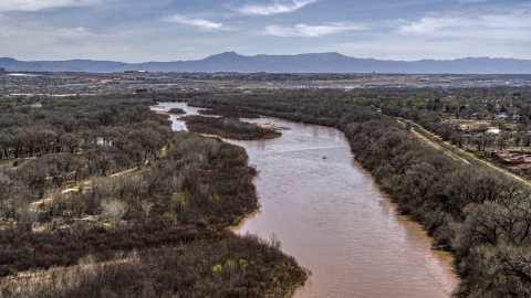 DXP002_124_0006 - Aerial stock photo of The Rio Grande, small islands in the river in Albuquerque, New Mexico