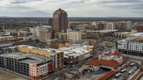 DXP002_127_0002 - Aerial stock photo of Albuquerque Plaza high-rise and neighboring city buildings, Downtown Albuquerque, New Mexico