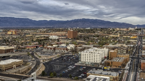 DXP002_127_0006 - Aerial stock photo of A wide view of office and apartment buildings, Downtown Albuquerque, New Mexico