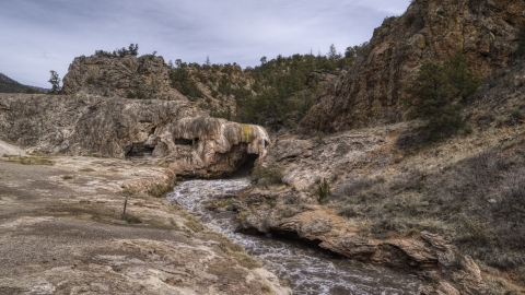 DXP002_129_0001 - Aerial stock photo of Rapids flowing through a rock formation in the mountains of New Mexico